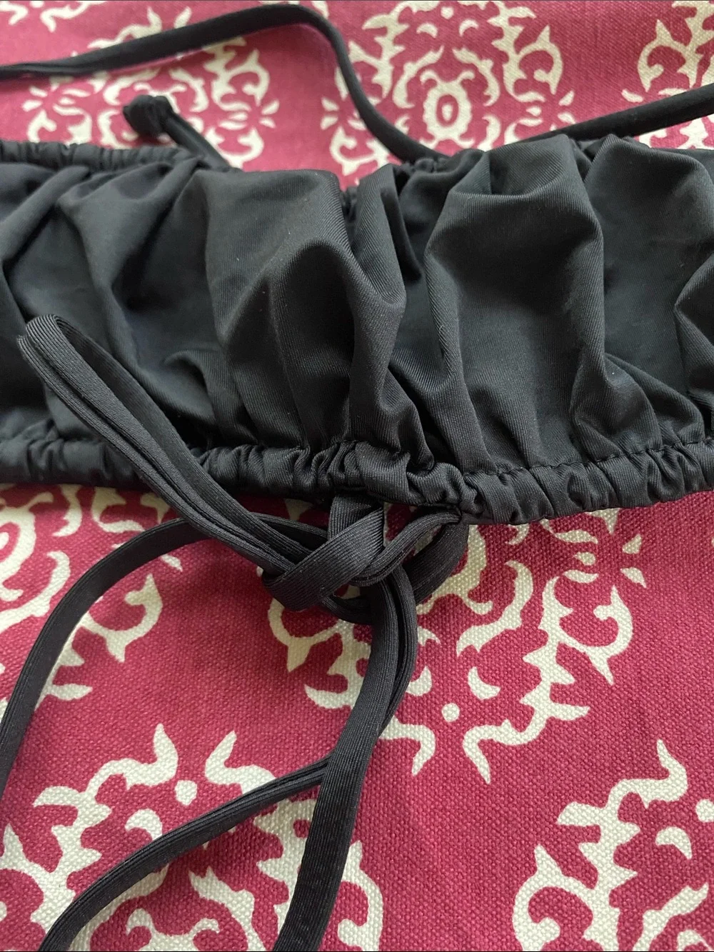 Frankie’s Bikinis black ruched bandeau top adjustable size S